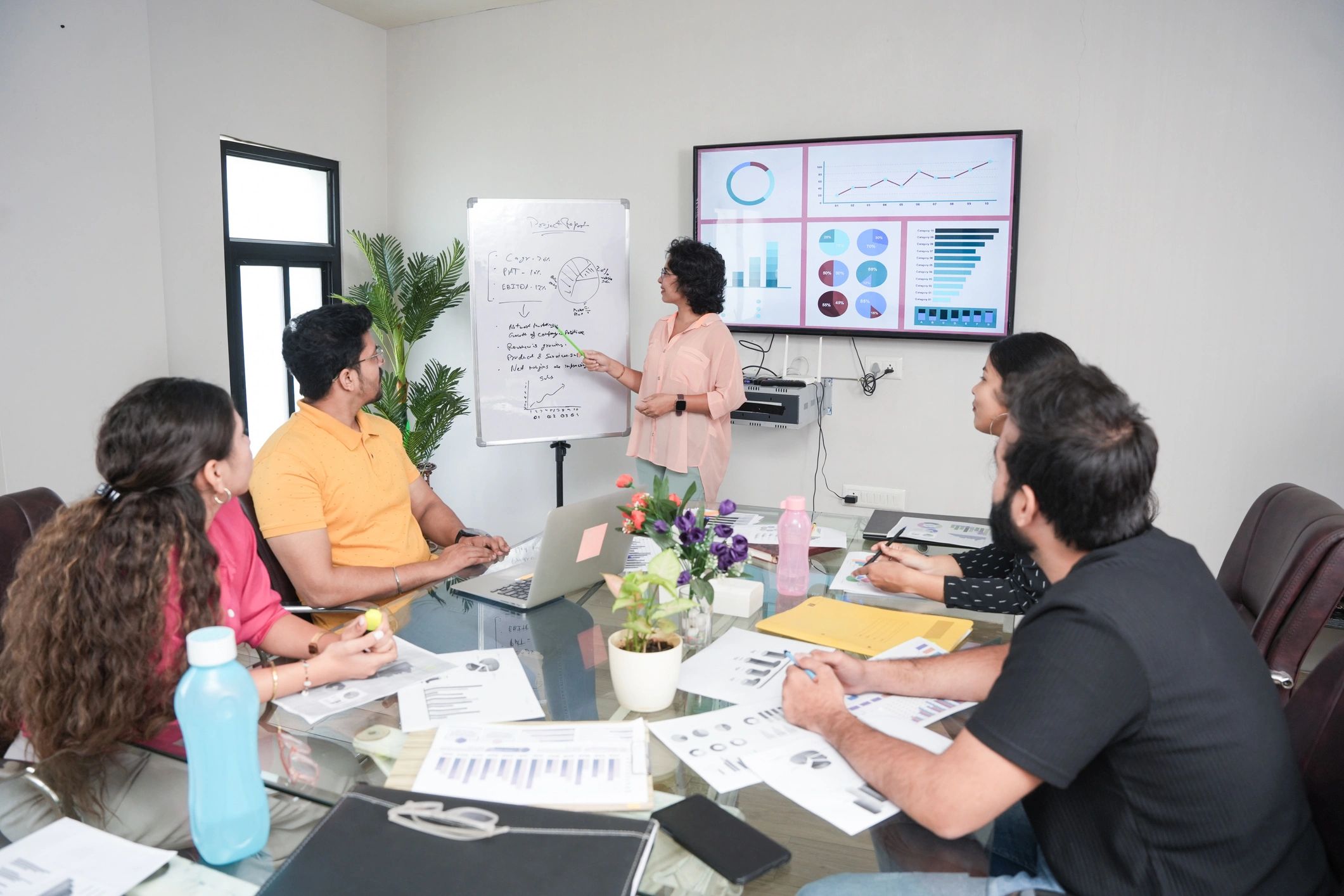 Indian media team collaborating during a newsroom-style planning session
